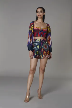 Saaksha & KinniÂ    I   Afghani bustier with attached sleeves  Navy blue mix booti satin shorts with tie up  Blouse - Satin   Shorts - Satin Multi   SS22115    SS22116