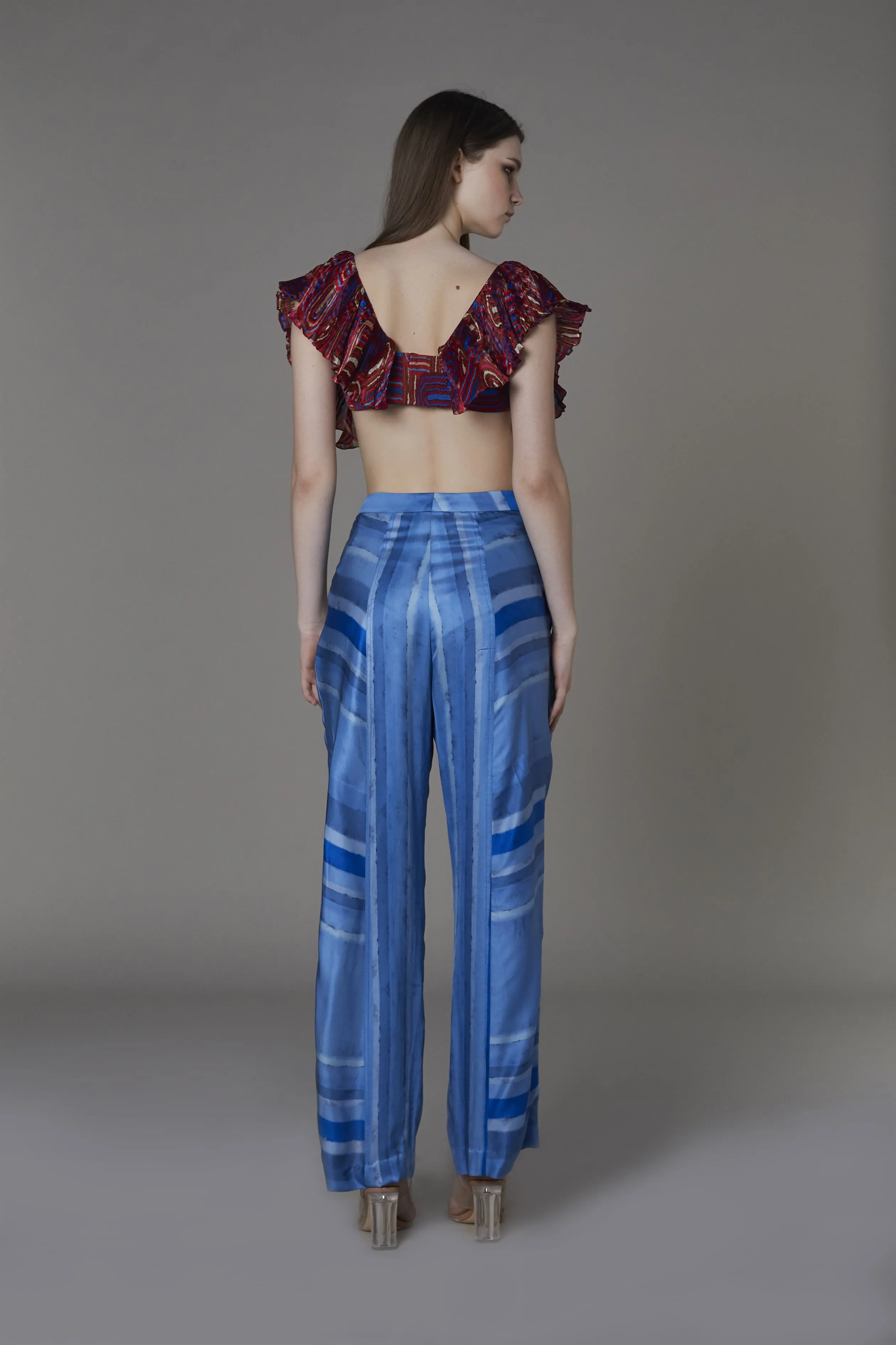 Saaksha & KinniÂ    I   Red semi circle filmy bra  Light blue/blue stripe pants Bralette - Chiffon / Satin  Trousers - Satin Bralette - Red/Multi  Trousers - Blue SS22132    SS22123