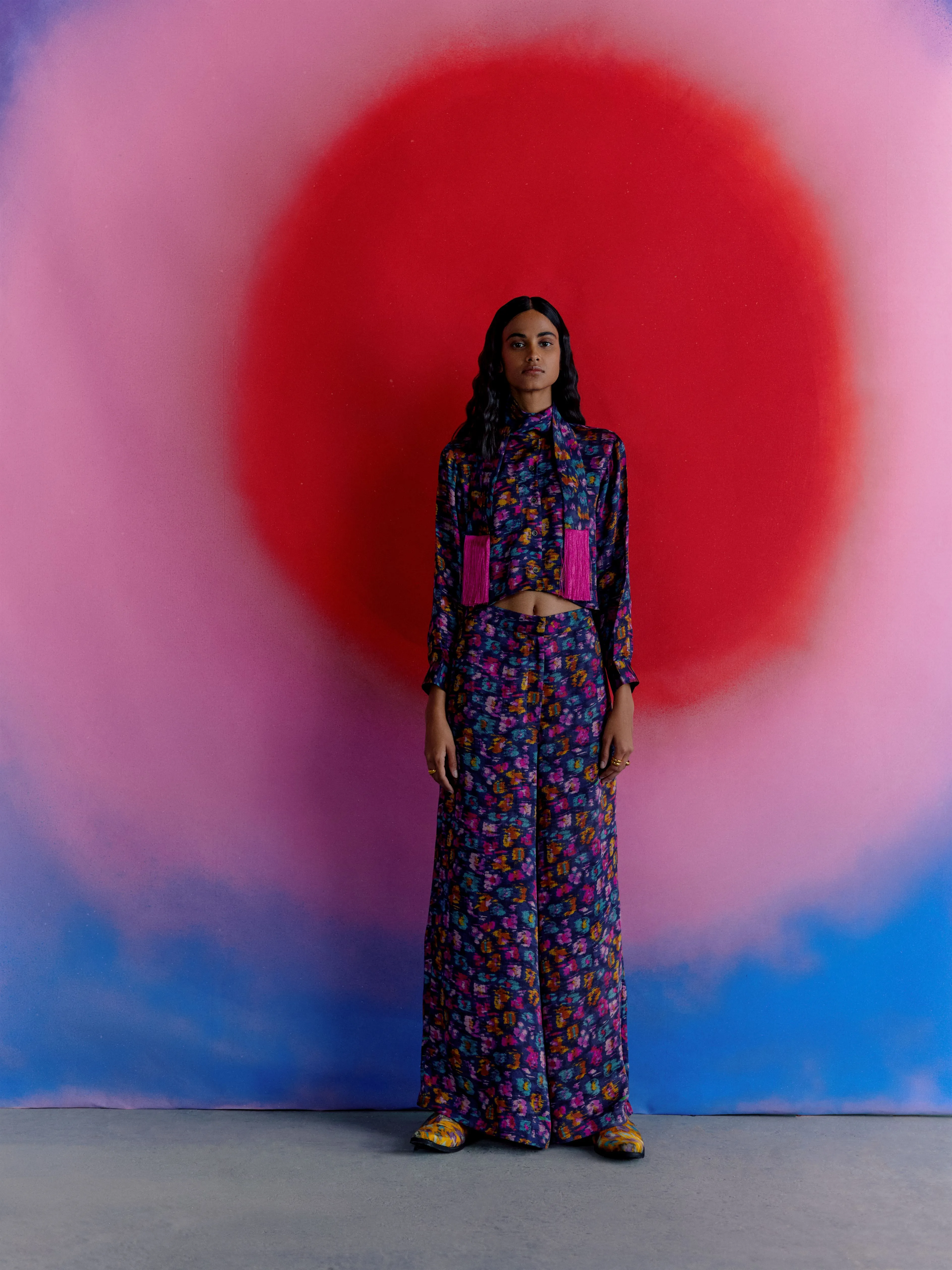 Studio Rigu   I   Womenswear, Western Warlow Flared Trousers Blue Base With Small Flower In Red /Pink/ Blue  Srdd010