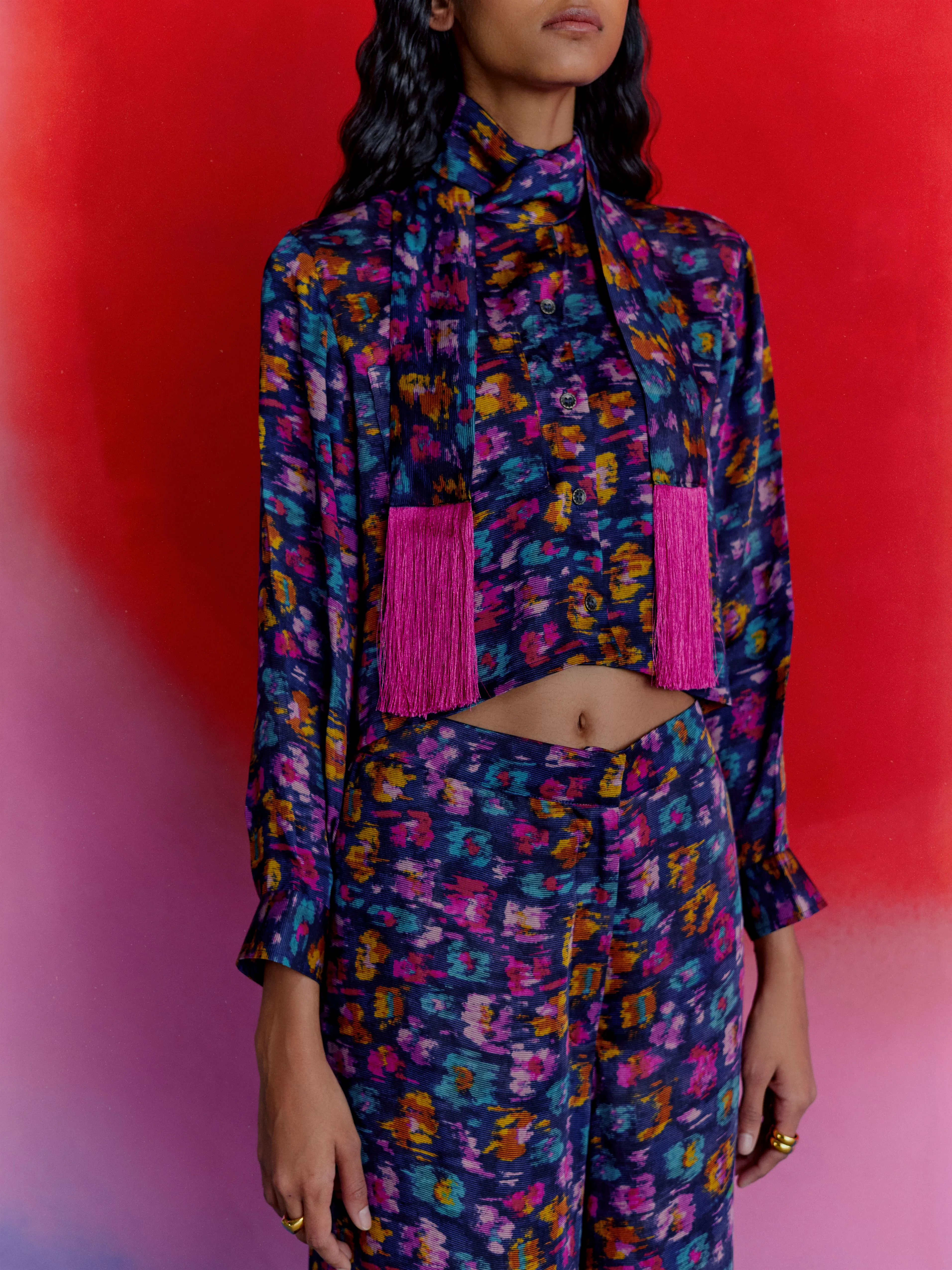 Studio Rigu   I   Womenswear, Western Warlow Flared Trousers Blue Base With Small Flower In Red /Pink/ Blue  Srdd010